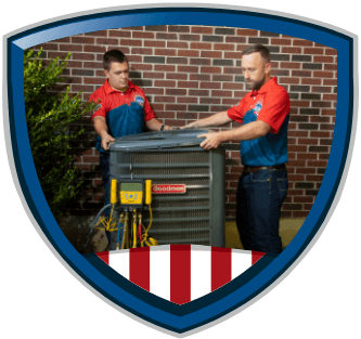 HVAC employees working on AC unit